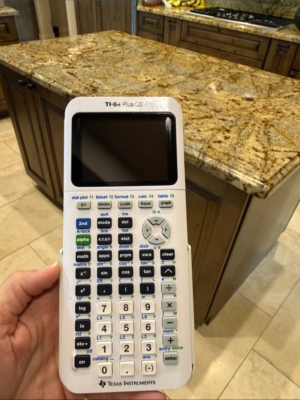 Texas Instruments White Graphing Calculator with Multicolored Keys